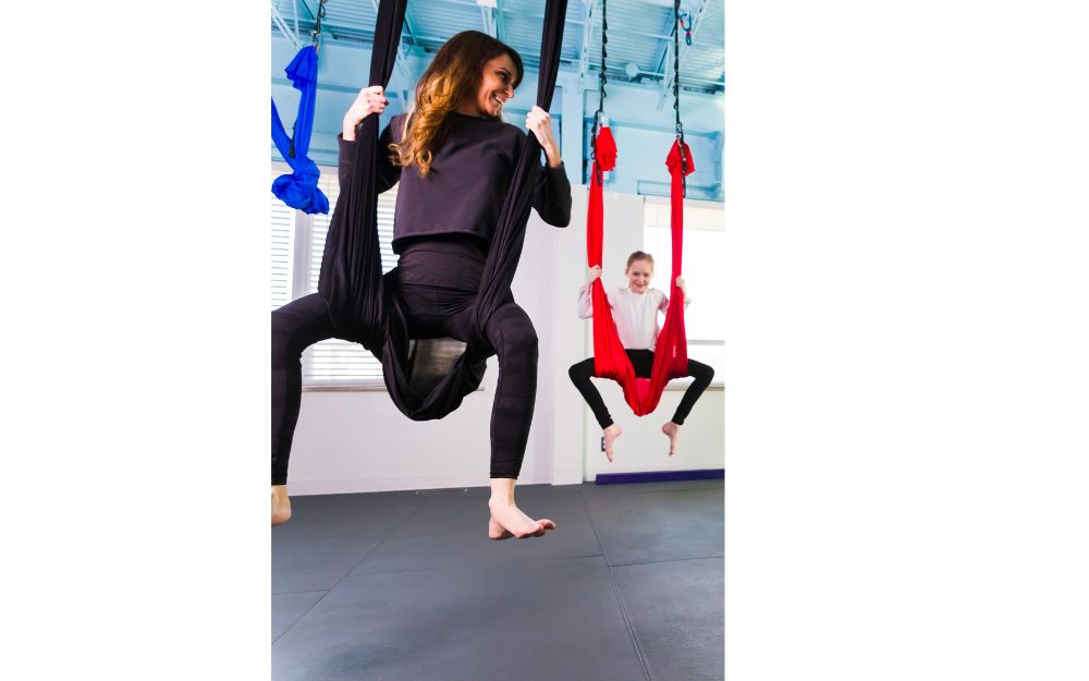 Spider aerial yoga pose